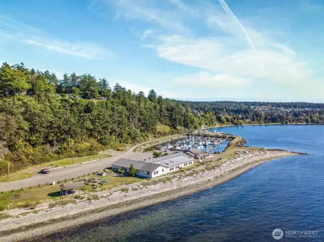 Aerial view of the beach, marina & clubhouse aras