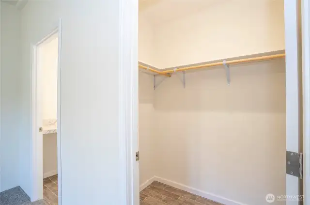 Primary Suite Walk-In Closet.