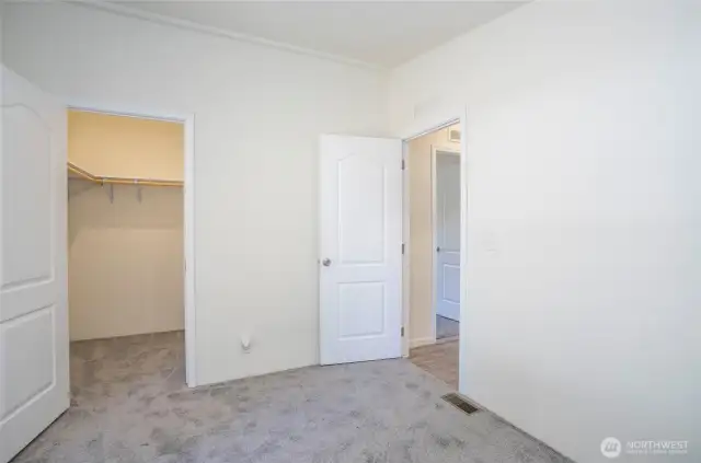 Guest Suite #2 with a spacious walk-in closet.