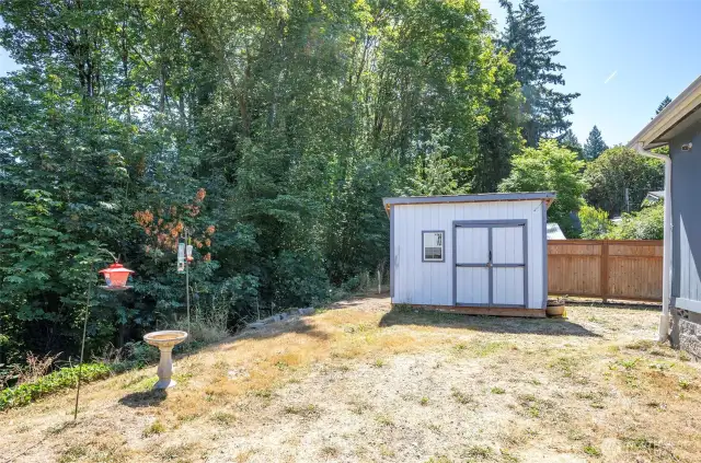 Handy shed offers extra space for all your yard and garden tools.