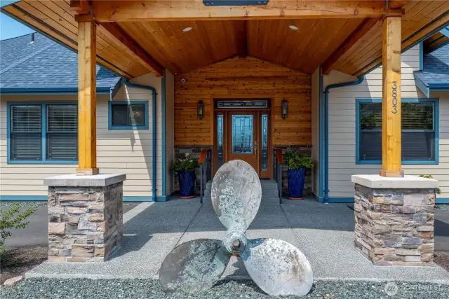 Drive-through carport at the grand entry - detailed in pine.