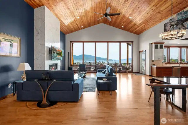 Step into a breathtaking, open design with vaulted ceilings of varnished Western Larch and expansive water views.
