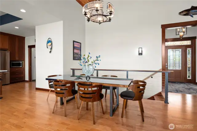 Dining area and stairs down to the finished basement level.