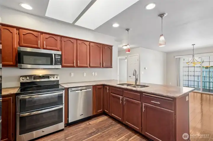 skylights and extra lighting in the kitchen too.