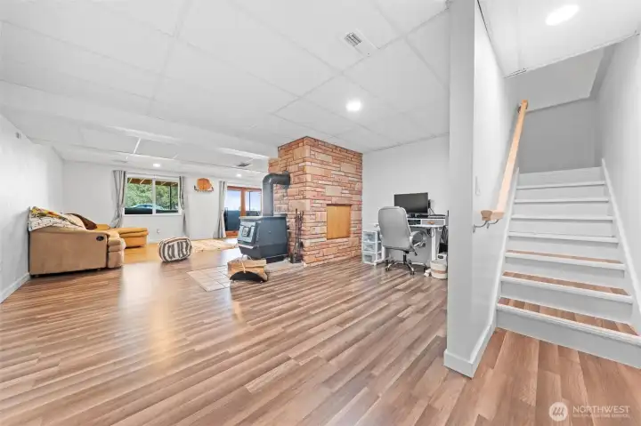 The lower level has its own wood stove.