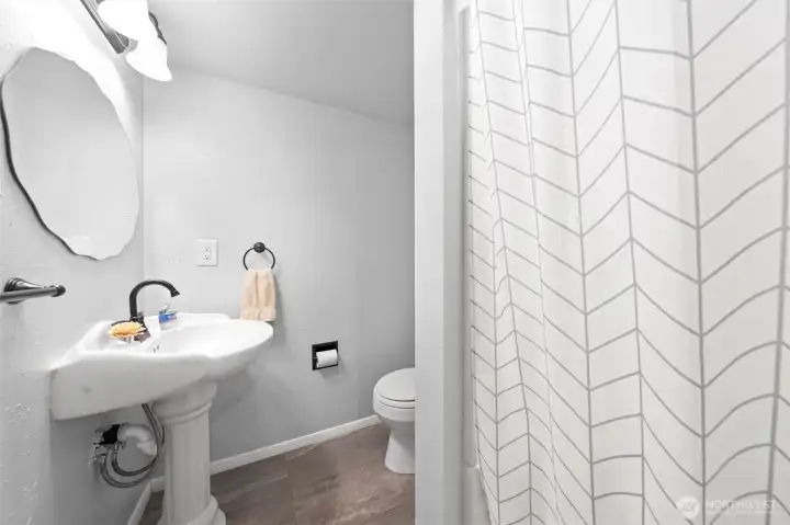 The lower 3/4 bathroom