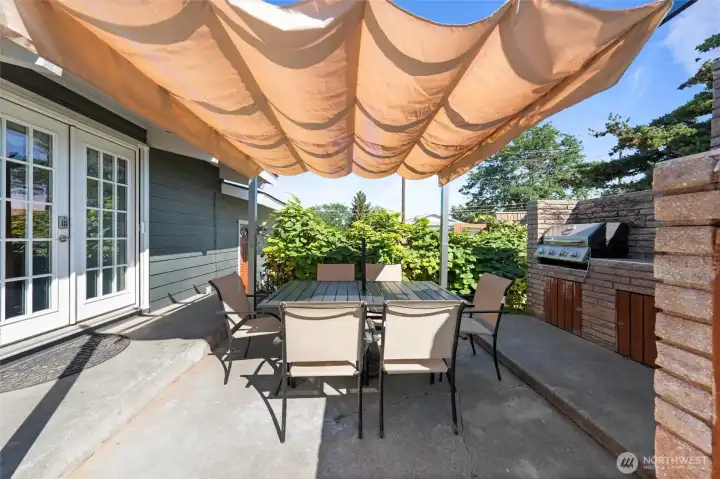 Enjoy the outdoor kitchen and fireplace year round.