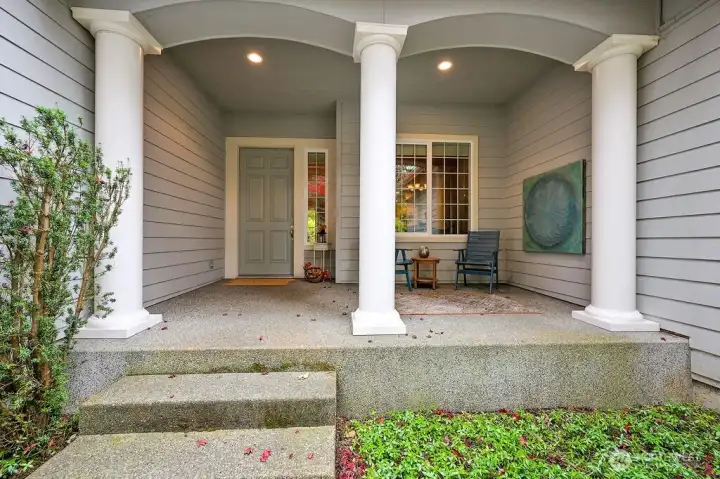 Step onto a charming front porch that sets the tone for this beautifully crafted, easy-living, single-level home.