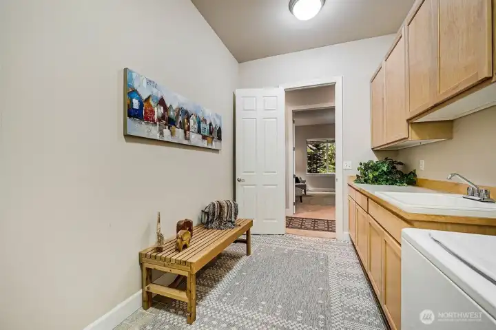 With plenty of space to work and organize, this laundry room makes daily tasks feel effortless and ease of doing laundry.