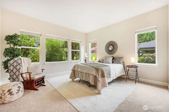 This angle of showcases the generous layout of the primary bedroom, with plenty of room for your furniture and personal touches.  There is plenty of wall space for dresser , you have a  peaceful retreat to bring your ideas
