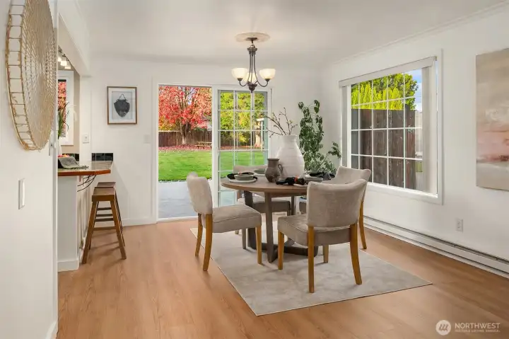 Spacious dining space perfectly positioned between kitchen and living space.