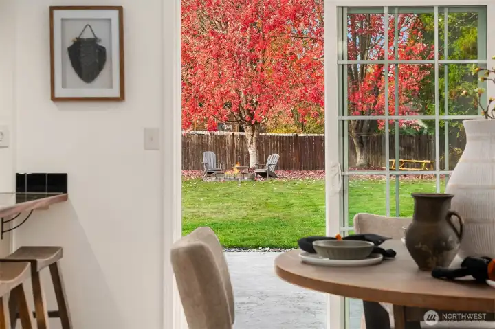 Slider off kitchen and dining allows seamless indoor/outdoor entertaining.