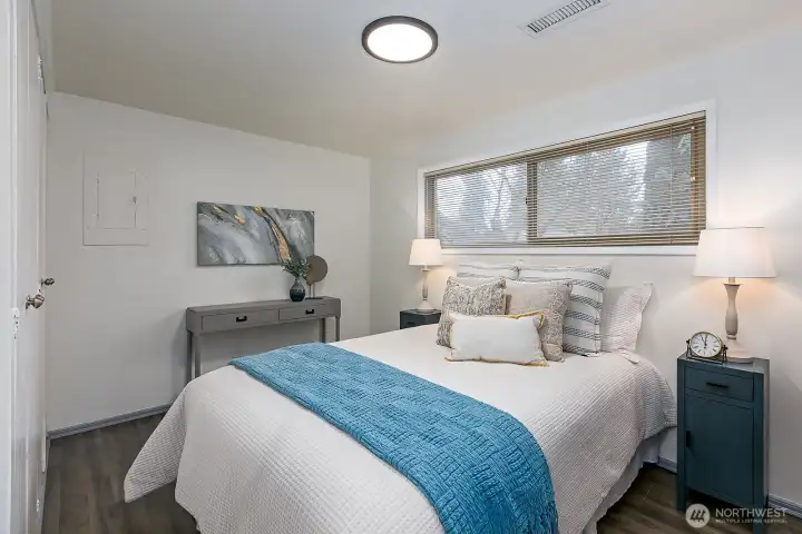 Spacious windows with natural light, new paint and flooring and double closets.