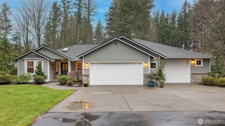 Custom home with oversized 3 car garage with workspace, owned by the same family for 30+ years