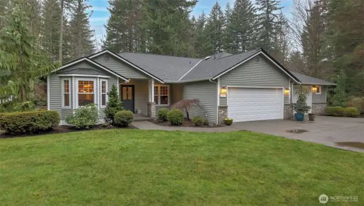 Custom home with oversized 3 car garage with workspace, owned by the same family for 30+ years