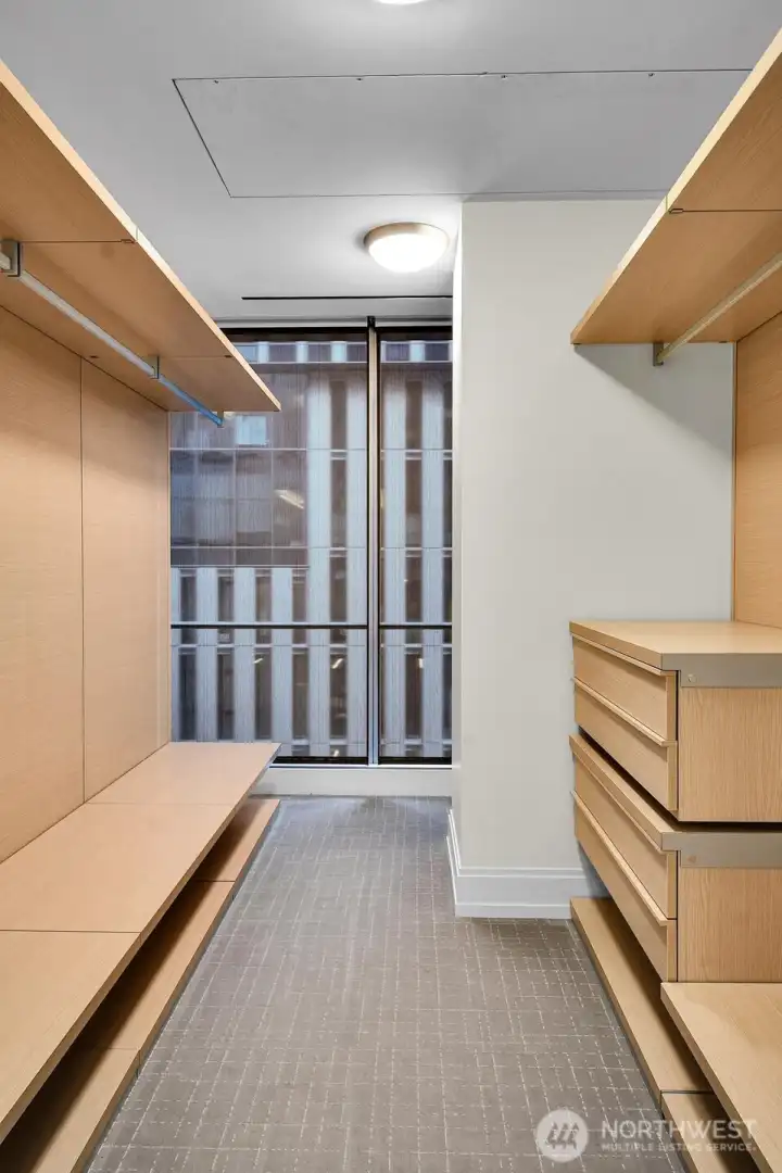 Primary bedroom walk-in closet.