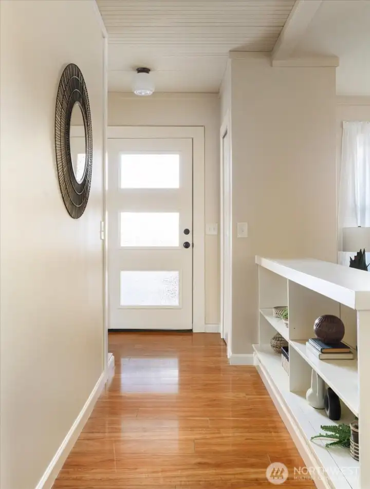 Step inside to warm wood floors and simple architectural details that set a welcoming tone the moment you enter.
