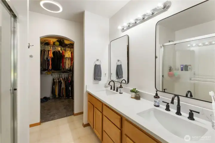 Primary bathroom looking toward the walk in closet.