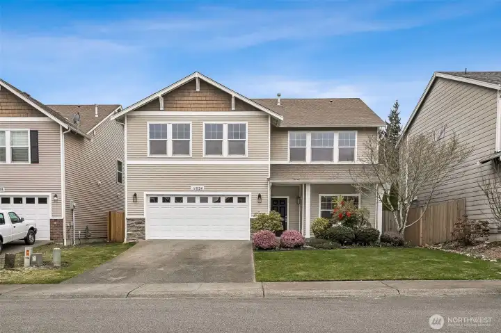 Welcome to this beautifully updated two-story in the wonderful Woodbriar Village community!
