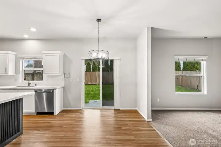 Lovely Dining Area has access to your fully fenced backyard.