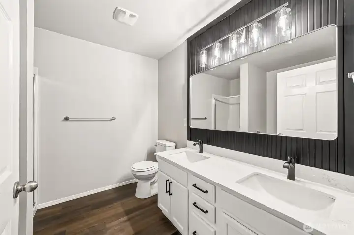 Beautifully updated primary bath. Soaking tub and shower along with dual sinks tick all the boxes.