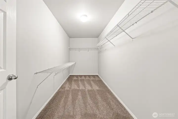 Place for all your clothes in the huge primary closet!