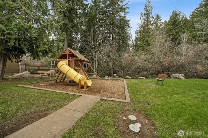 Fun playground one street over. Woodbriar Village is a great place to live!