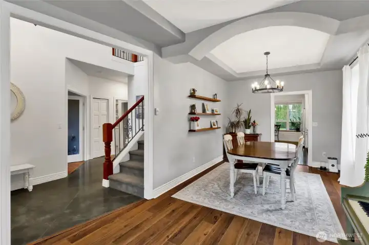 Formal dining room with coffered ceiling