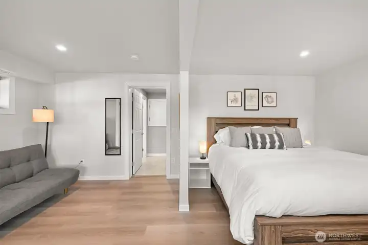 Large lower-level suite offers room for sleeping, sitting area, or home office setup.