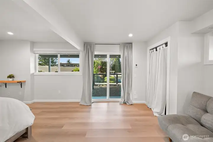 Spacious lower-level suite with private exterior access and abundant natural light.
