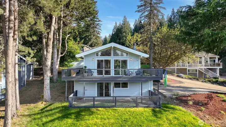 Tucked into a tree-lined setting near the lake, offering a balance of privacy, nature, and neighborhood living.