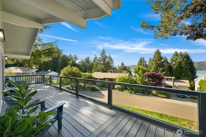Contemporary exterior with wraparound decking and usable outdoor space designed to extend living areas outside.