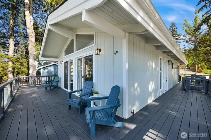Spacious wraparound deck designed for outdoor dining, relaxing, and enjoying the view.