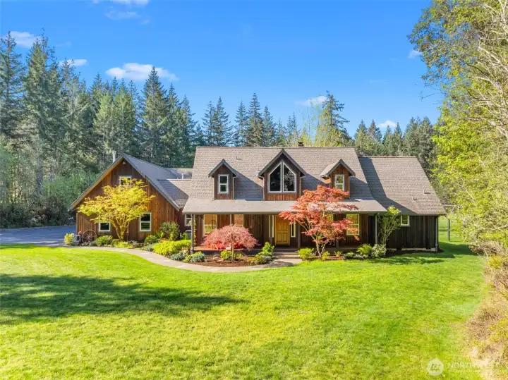 With all the bells and whistles, this custom home on five + acres of beautiful grounds will be the perfect place to write your next chapter