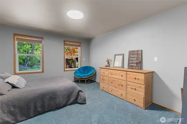 Second main floor bedroom (in addition to the main floor primary)
