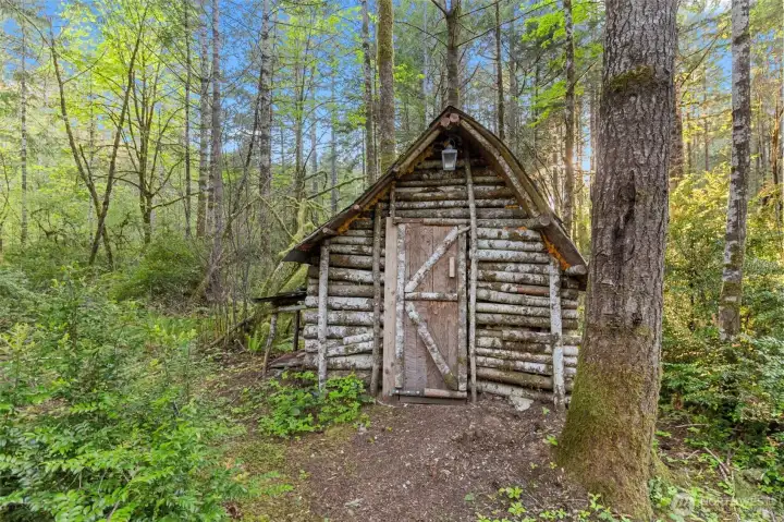 Down one of the groomed trails you will find this charming log cabin, complete with working wood stove