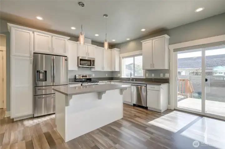 Sliding door leads to back deck