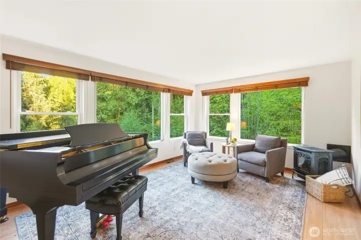 A formal living room off of the kitchen.