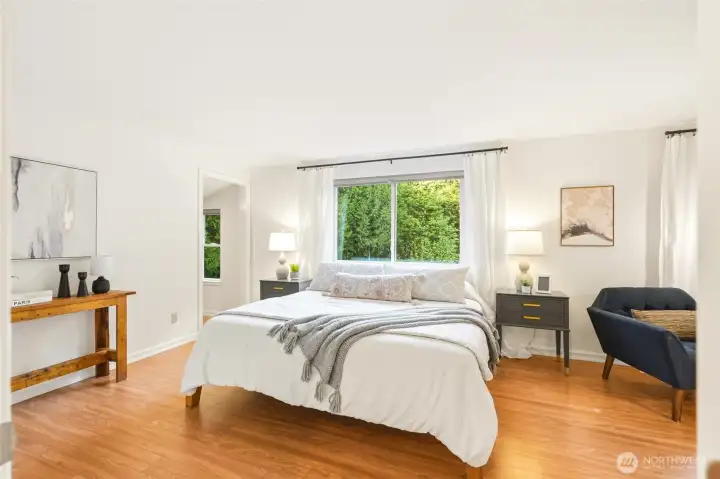 The primary bedroom features exquisite nature views and a large walk-in closet.