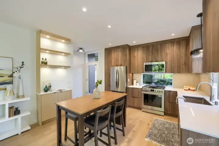 Another view of the kitchen and dining space.
