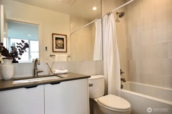 The full bath in the hall.