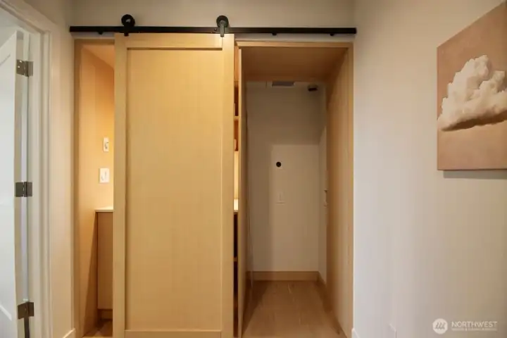 The barn door closes over the appliances.