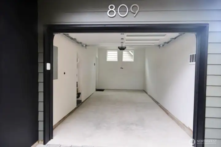 The garage is attached and spacious.