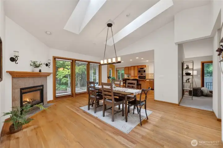 Looking across the formal dining area toward the kitchen and informal dining room.