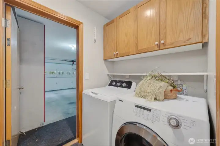 Looking from the laundry room to the garage which has no stairs.