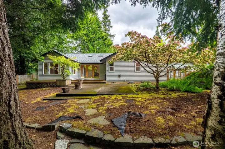 There is also a big patio off the deck and stunning trees.