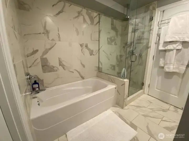 Unit A primary bath. Just to the left is a huge walk-in closet