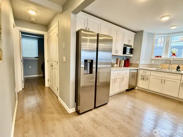Unit B looking down the hallway to second bedroom