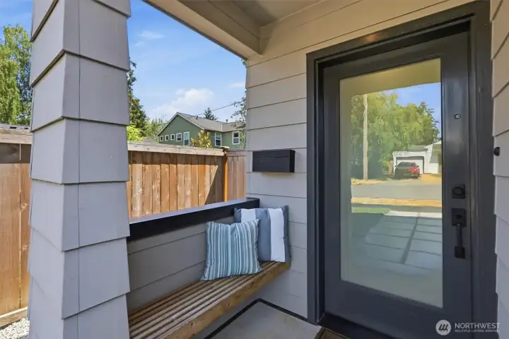 Charming entry with custom wood bench Charming entry with custom wood bench