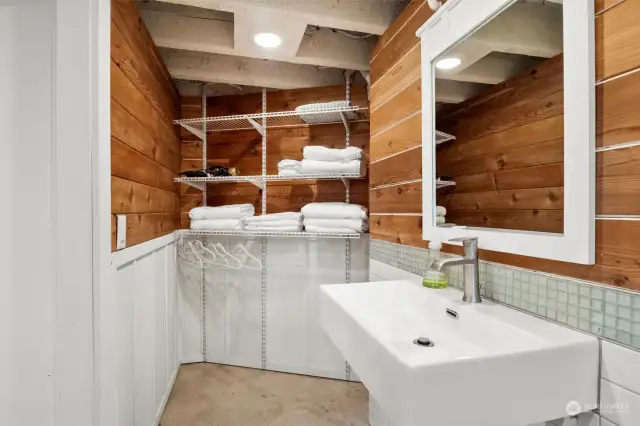 Primary half bath with extra storage.